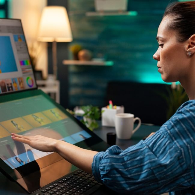 Professional editor doing retouching work on image